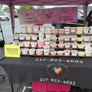 A variety of candies on tables.